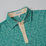 USF Bulls Fairway Floral four-button polo in green and gold floral pattern