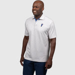 Man wearing a white UF polo shirt with a logo on a light gray background