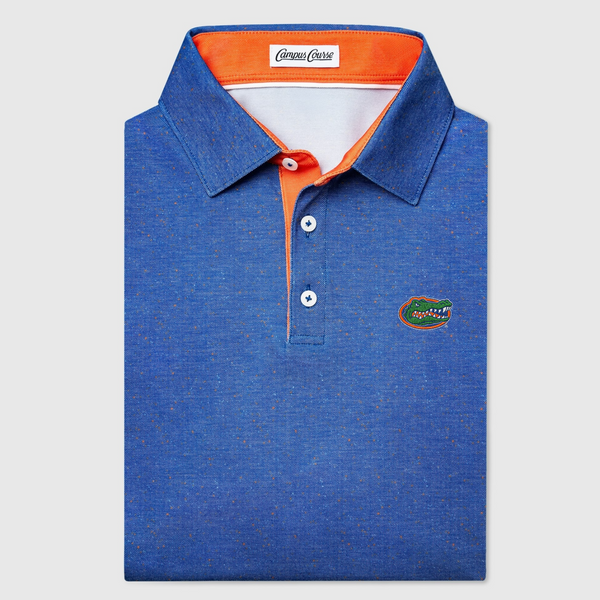 Blue UF polo shirt with orange accents and 'Florida' embroidery on a light gray background