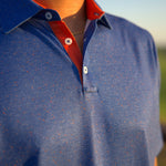 Won't Back Down Stadium Speckle polo orange and blue Tampa made